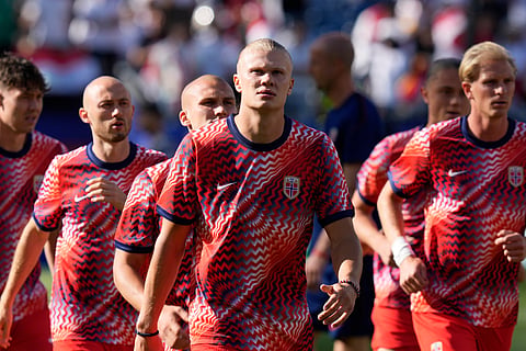 Norway's Erling Haaland, center, warms up prior to the World Cup Group I soccer match between Iraq and Norway in Foxborough, Mass., near Boston, Tuesday, June 16, 2026.