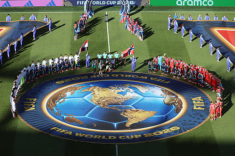 Players stand for the National Anthem during the World Cup Group I soccer match between Iraq and Norway in Foxborough, Mass., near Boston, Tuesday, June 16, 2026.
