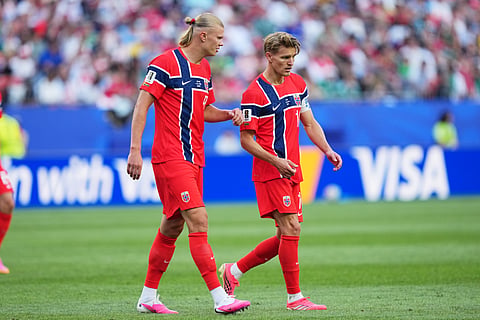 Norway's Erling Haaland, left, and Martin Oedegaard talk during the World Cup Group I soccer match between Iraq and Norway in Foxborough, Mass., near Boston, Tuesday, June 16, 2026.