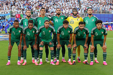 Algeria players pose for a group photo before the World Cup Group J soccer match between Argentina and Algeria in Kansas City, Mo., Tuesday, June 16, 2026.