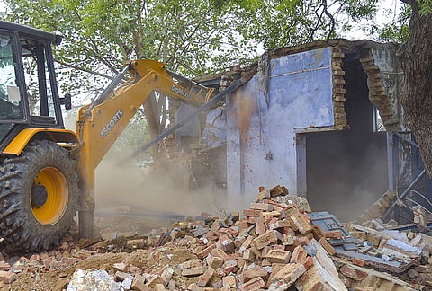 Authorities carry out a demolition drive at an alleged illegally constructed madrasa, at Kusliya village, in Ghaziabad, Uttar Pradesh.