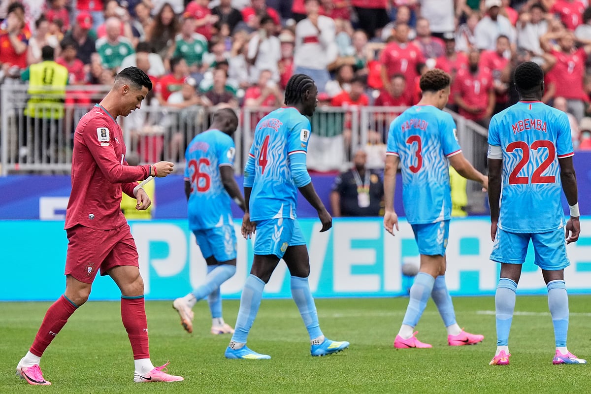 Portugal's Cristiano Ronaldo, left, reacts after failing to score during the World Cup Group K soccer match - AP/Ashley Landis