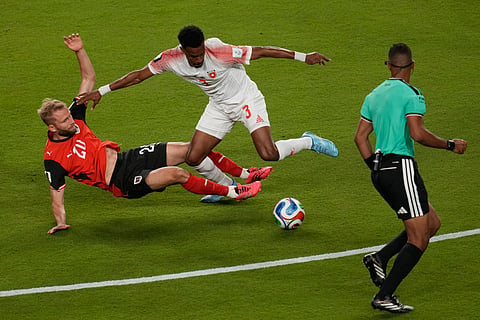 Austria's Konrad Laimer, left, and Jordan's Abdallah Nasib battle for the ball during the World Cup Group J soccer match in Santa Clara, Calif., near San Francisco, Tuesday, June 16, 2026.