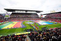 AP Photo : Ghana and Panama take to the field before the World Cup Group L soccer match in Toronto