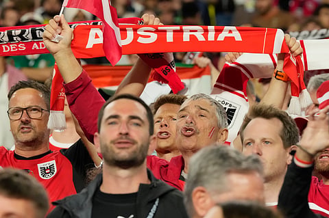 Supporters of Austria sing the national anthem before the World Cup Group J soccer match between Austria and Jordan in Santa Clara, Calif., near San Francisco, Tuesday, June 16, 2026.