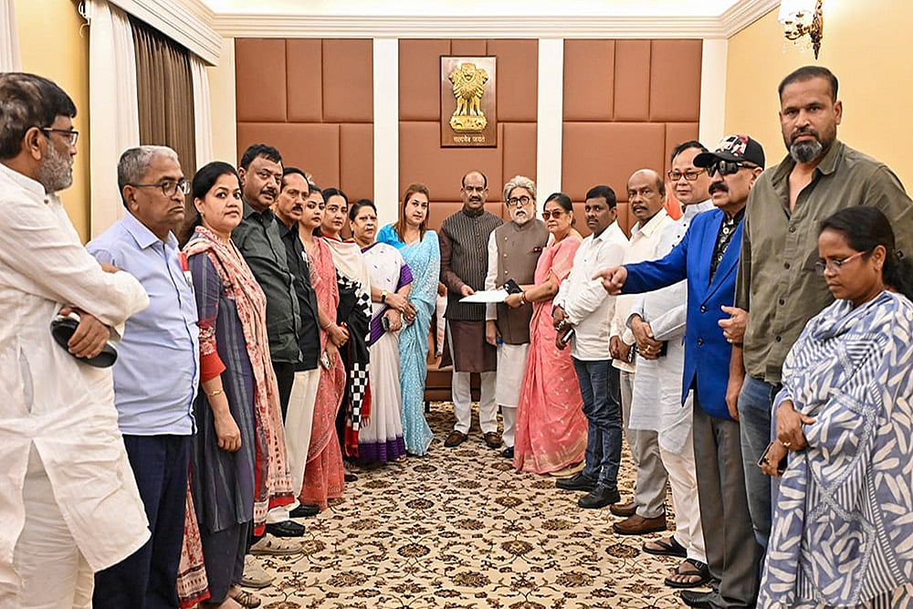 Lok Sabha Speaker Om Birla receives a letter from TMC MPs including Sudip Bandyopadhyay, Satabdi Roy, Kakoli Ghosh Dastidar, Mala Roy, Yusuf Pathan, and others for separate seating arrangement in the House, in New Delhi. - Photo: Handout via PTI 