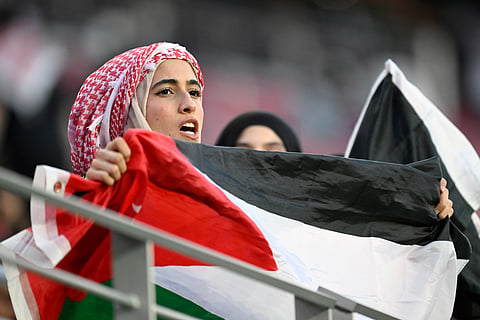 A fan cheers before the World Cup Group J soccer match between Austria and Jordan in Santa Clara, Calif., near San Francisco, Tuesday, June 16, 2026.