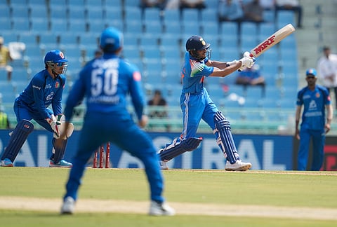 India's captain Shubman Gill hits a four during the second ODI cricket match between India and Afghanistan in Lucknow.