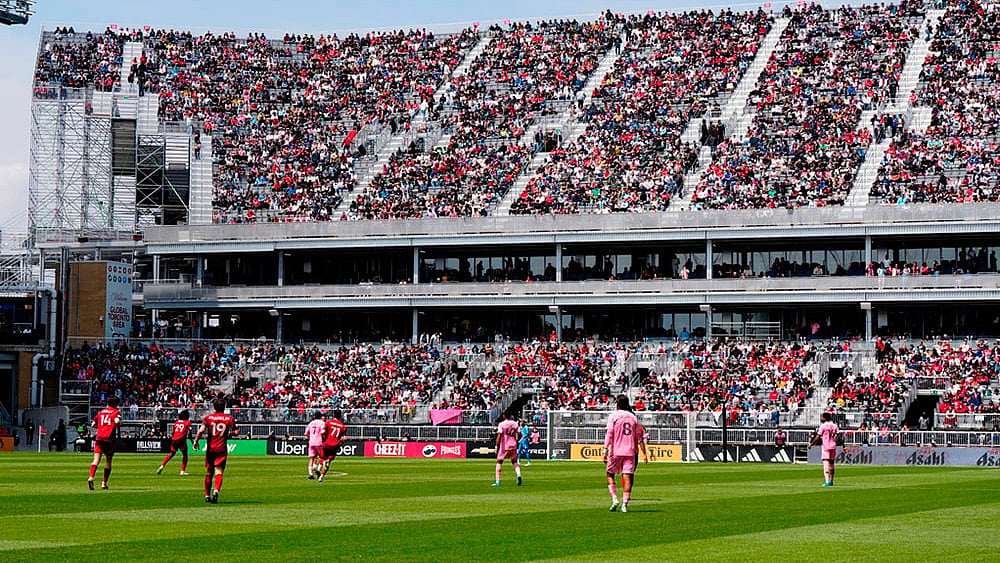 Fans watch from temporary stands at BMO Field, which were built to accommodate more fans for the 2026 World Cup, during first half MLS soccer between Toronto FC and Inter Miami CF, in Toronto. - | Photo: Frank Gunn /The Canadian Press via AP