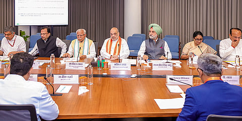 Union Home Minister Amit Shah, Union Minister Manohar Lal Khatter, Lieutenant Governor of Delhi Taranjit Singh Sandhu, Delhi Chief Minister Rekha Gupta and others during a meeting on rehabilitation and resettlement of slums in Delhi. 