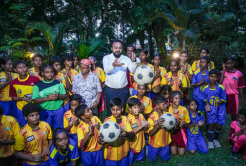 Minister of State (Independent Charge) for Youth Services and Sports Dr Indranil Khan interacts with young footballers during a press conference at Calcutta Sports Journalist Club, in Kolkata, West Bengal.