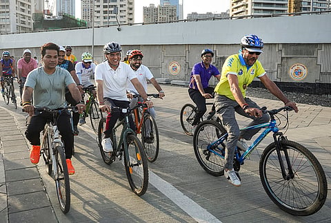 Union Youth Affairs and Sports Minister Mansukh Mandaviya along with Bollywood actor Jackie Shroff take part in the ‘Fit India Cyclothon – Cycling by the Sea’ organised under the Fit India Movement, in Mumbai, Maharashtra.