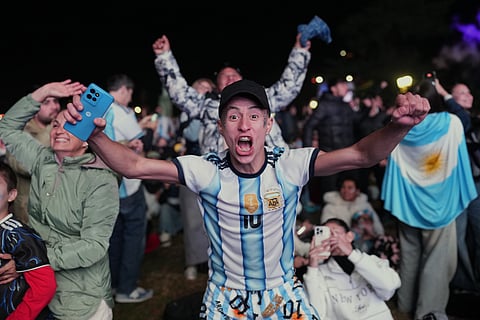Fans celebrate Argentina's first goal as they watch the World Cup soccer match between Argentina and Algeria in Buenos Aires, Argentina, Tuesday, June 16, 2026.