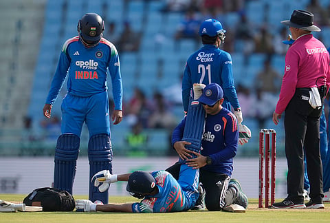 A physio attends India's captain Shubman Gill during the second ODI cricket match between India and Afghanistan in Lucknow.