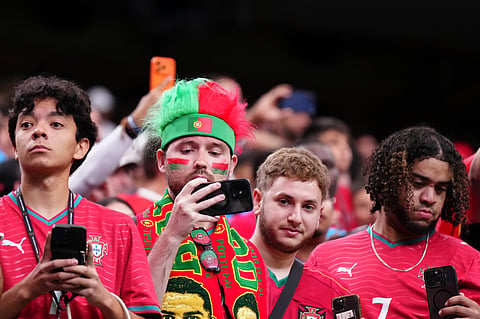 Portugal supporters wait for the start of the World Cup Group K soccer match between Portugal and Congo in Houston, Wednesday