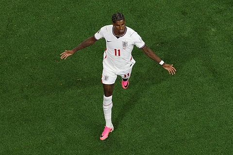 England's Marcus Rashford (11) celebrates after scoring during the World Cup Group L soccer match between England and Croatia in Arlington, Texas, near Dallas