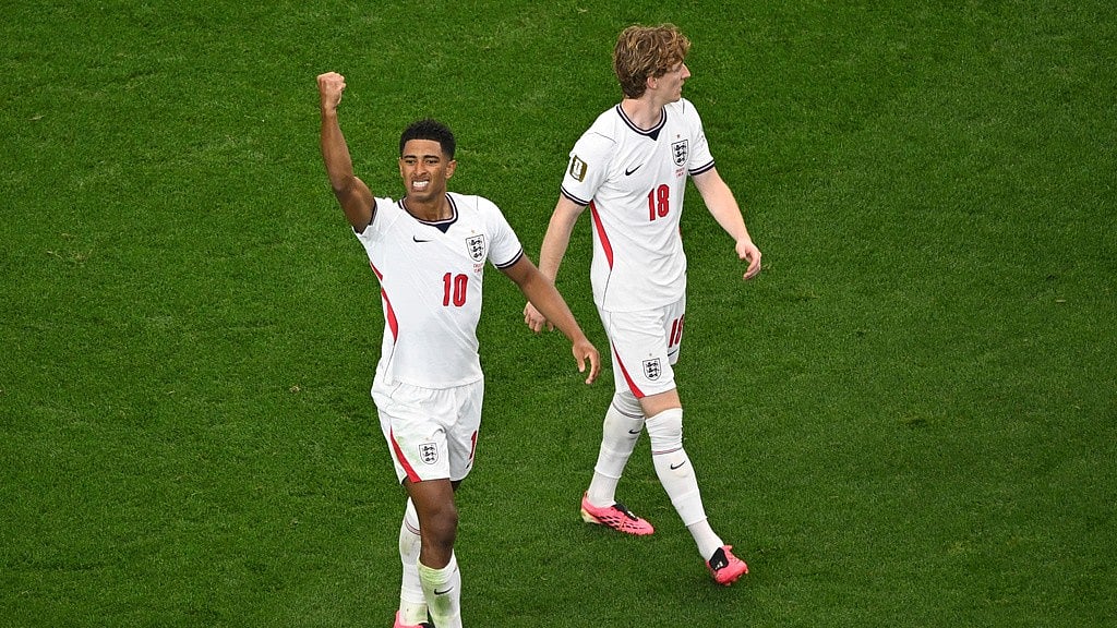 England's Jude Bellingham (10), left, celebrates after scoring his side's third goal during the World Cup Group L soccer match between England and Croatia in Arlington, Texas, near Dallas. - AP Photo