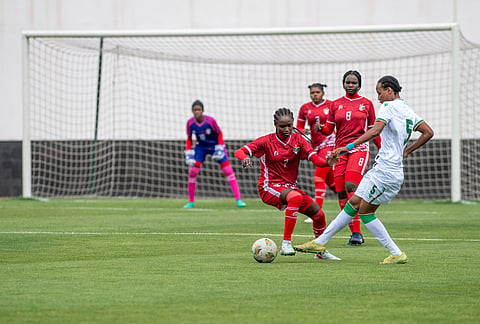 Sudan's U-17 women's national team, in red, plays a soccer match against Comoros, during qualifiers for the 2028 Los Angeles Summer Olympics, in Casablanca, Morocco.