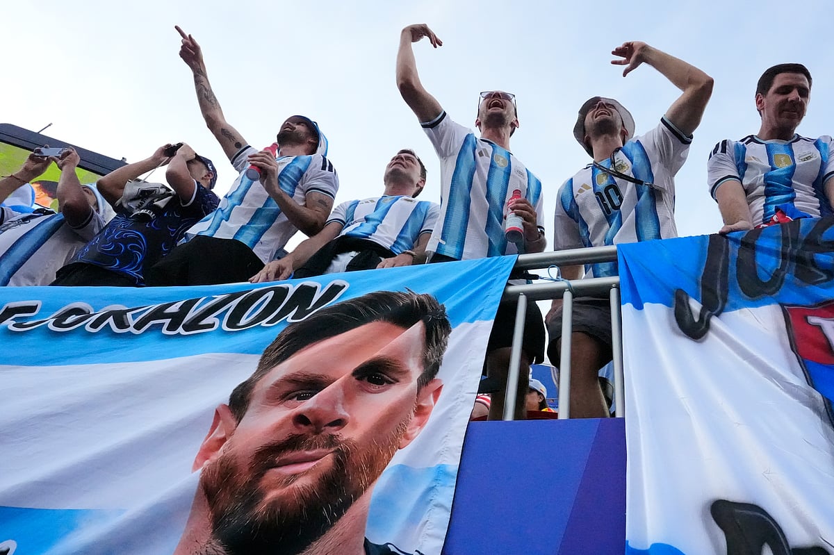 Argentinian fans react ahead of the World Cup Group J soccer match between Argentina and Algeria in Kansas City, Mo., Tuesday, June 16, 2026. - AP Photo/Charlie Riedel