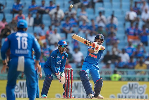 India's Ishan Kishan hits a six during the second ODI cricket match between India and Afghanistan in Lucknow.