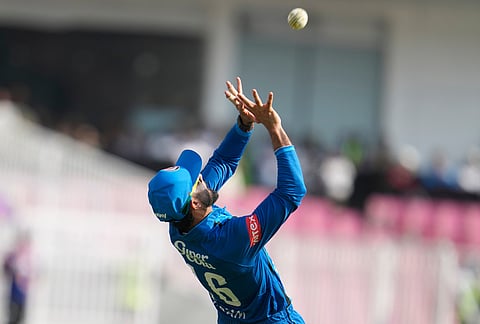 Afghanistan's Ikram Alikhil takes the catch to dismiss India's Ishan Kishan during the second ODI cricket match between India and Afghanistan in Lucknow.
