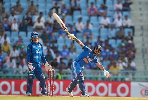 India's Ishan Kishan hits a six during the second ODI cricket match between India and Afghanistan in Lucknow.