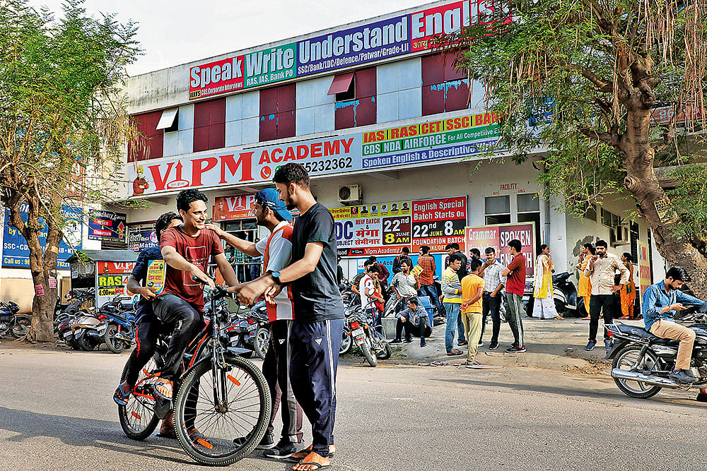 Education Supplement: Government job aspirants outside a coaching institute in Jaipur - | Photo: Suresh K. Pandey
