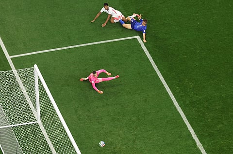 England's Jude Bellingham (10) scores their third goal during the World Cup Group L soccer match between England and Croatia in Arlington, Texas, near Dallas