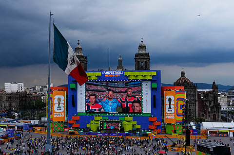 Fans watch the 2026 FIFA World Cup match between Norway and Iraq in the Zócalo, Mexico City's main square in Mexico City, Tuesday, June 16, 2026.