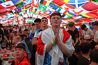 AP Photo : England supporters react during the World Cup soccer match between England and Croatia at The Clock pub in Hebburn, England.
