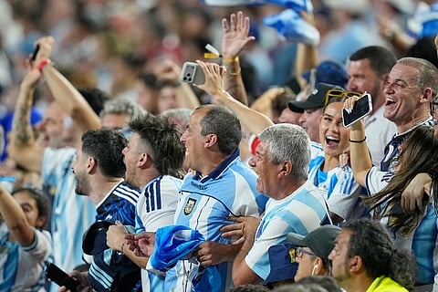 Fans react during the World Cup Group J soccer match between Argentina and Algeria in Kansas City, Mo., Tuesday, June 16, 2026.