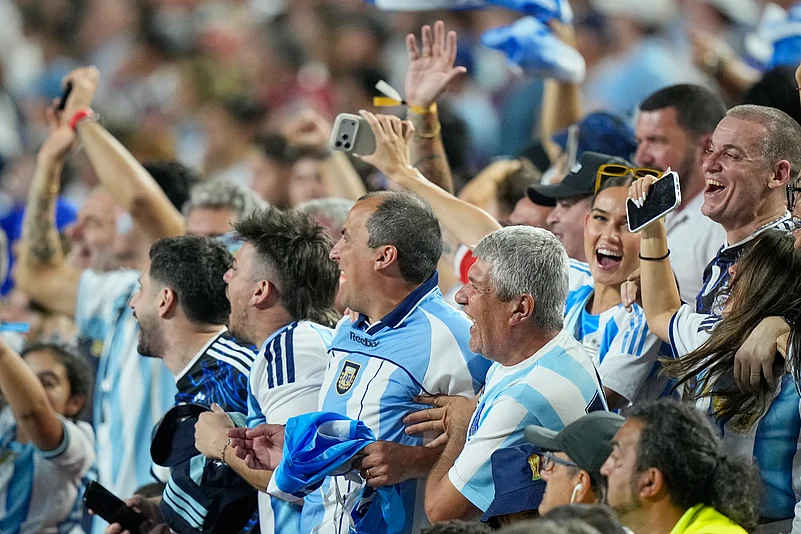 Fans react during the World Cup Group J soccer match between Argentina and Algeria in Kansas City, Mo., Tuesday, June 16, 2026.