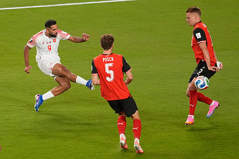 Jordan's Ali Olwan, left, scores his side's opening goal against Austria during the World Cup Group J soccer match in Santa Clara, Calif., near San Francisco, Tuesday, June 16, 2026.