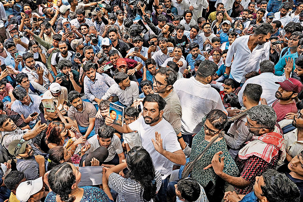 Peaceful Resistance: The founder of the Cockroach Janta Party, Abhijeet Dipke (centre), at a protest in Jantar Mantar in New Delhi on June 6, 2026 - | Photo: Suresh K. Pandey