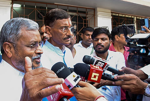 Union MoS Sanjay Seth present as LoP in Jharkhand Assembly Babulal Marandi speaks with the media after the RSS alleged that petrol bombs were hurled at its office, in Ranchi.
