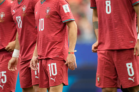 Portugal players gather before the start of the World Cup Group K soccer match