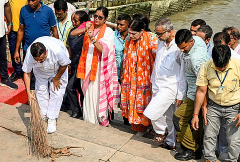 West Bengal Chief Minister Suvendu Adhikari takes part in the ‘Swachhata Se Swagat’ cleanliness drive ahead of Prime Minister Narendra Modi’s visit to the state for International Day of Yoga 2026, at Mayer Ghat Baghbazar, in Kolkata. State Cabinet Ministers Agnimitra Paul, Tapas Roy and others are also present. 