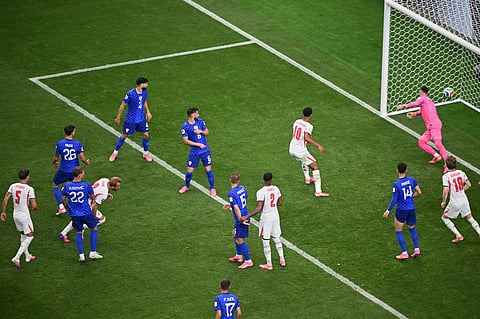 England's Harry Kane (9) scores during the World Cup Group L soccer match between England and Croatia in Arlington, Texas, near Dallas