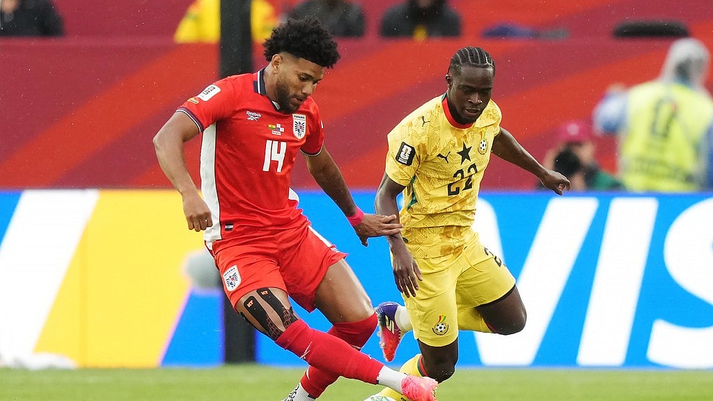 Panama's Carlos Harvey (14) protects the ball from Ghana's Kamaldeen Sulemana (22) during the World Cup Group L soccer match in Toronto. - AP Photo