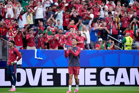 Portugal's Cristiano Ronaldo applauds the fans during warmup