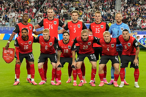 Austria players pose for a team photo ahead of the World Cup Group J soccer match between Austria and Jordan in Santa Clara, Calif., near San Francisco, Tuesday, June 16, 2026.