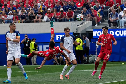 Switzerland's Dan Ndoye (11) attemps a scissor kick during the World Cup Group B soccer match between Switzerland and Bosnia in Inglewood, Calif, near Los Angeles, Thursday, June 18, 2026.
