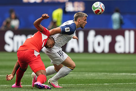 Switzerland's Manuel Akanji, left, and Bosnia's Ermedin Demirovic fight for the ball during the World Cup Group B soccer match between Switzerland and Bosnia in Inglewood, Calif., near Los Angeles, Thursday, June 18, 2026.