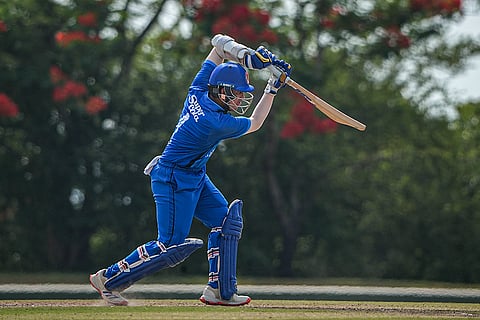 In this image received on June 17, 2026, Afghanistan's Faisal Shinozada plays a shot during the fifth match between India A and Afghanistan A in the Tri-Nation A Series, in Dambulla, Sri Lanka.