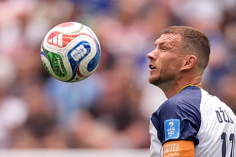 Bosnia's Edin Dzeko jumps for the ball during the World Cup Group B soccer match against Switzerland in Inglewood, Calif., near Los Angeles, Thursday, June 18, 2026.