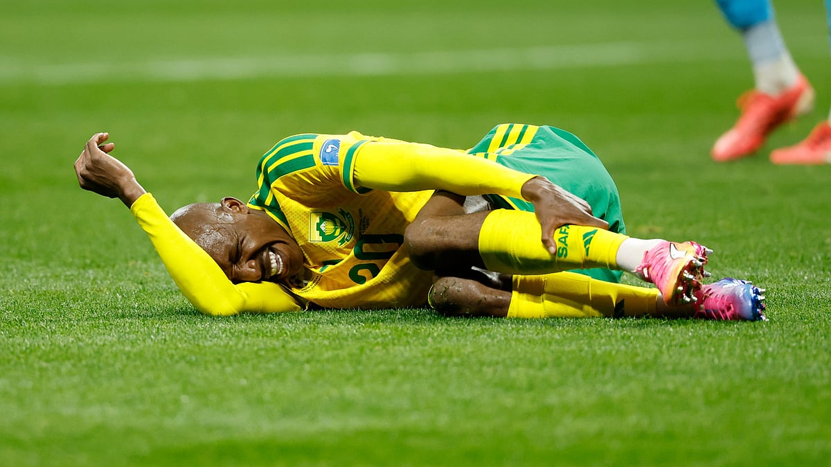 South Africa's Khuliso Mudau lies on the ground during the World Cup Group A soccer match between Czechia and South Africa in Atlanta, Thursday, June 18, 2026. - (AP Photo/Erik S. Lesser)