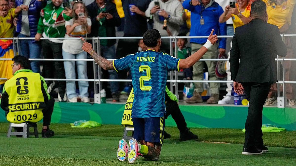 Colombia's Daniel Munoz celebrates after scoring his team's first goal during the World Cup Group K soccer match between Uzbekistan and Colombia in Mexico City, Wednesday, June 17, 2026 - (AP Photo/Natacha Pisarenko)
