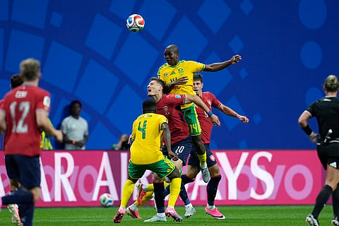South Africa's Mbekezeli Mbokazi heads the ball above Czechia's Patrik Schick during the World Cup Group A soccer match between Czechia and South Africa in Atlanta, Thursday, June 18, 2026.