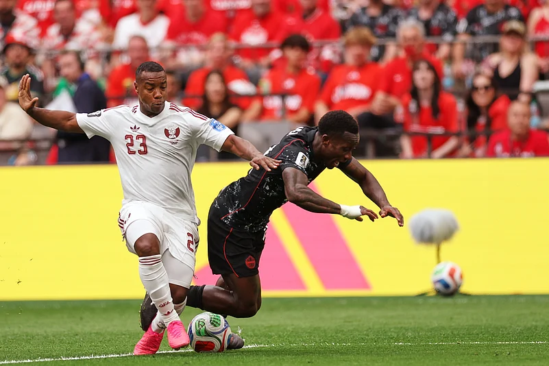 Canada vs Qatar FIFA World Cup 2026 Group B Assim Madibo and Cyle Larin AP Photo