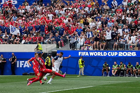 Bosnia's Sead Kolasinac (5), right, tries to score next to Switzerland's Silvan Widmer (3) during the World Cup Group B soccer match between Switzerland and Bosnia in Inglewood, Calif, near Los Angeles, Thursday, June 18, 2026.